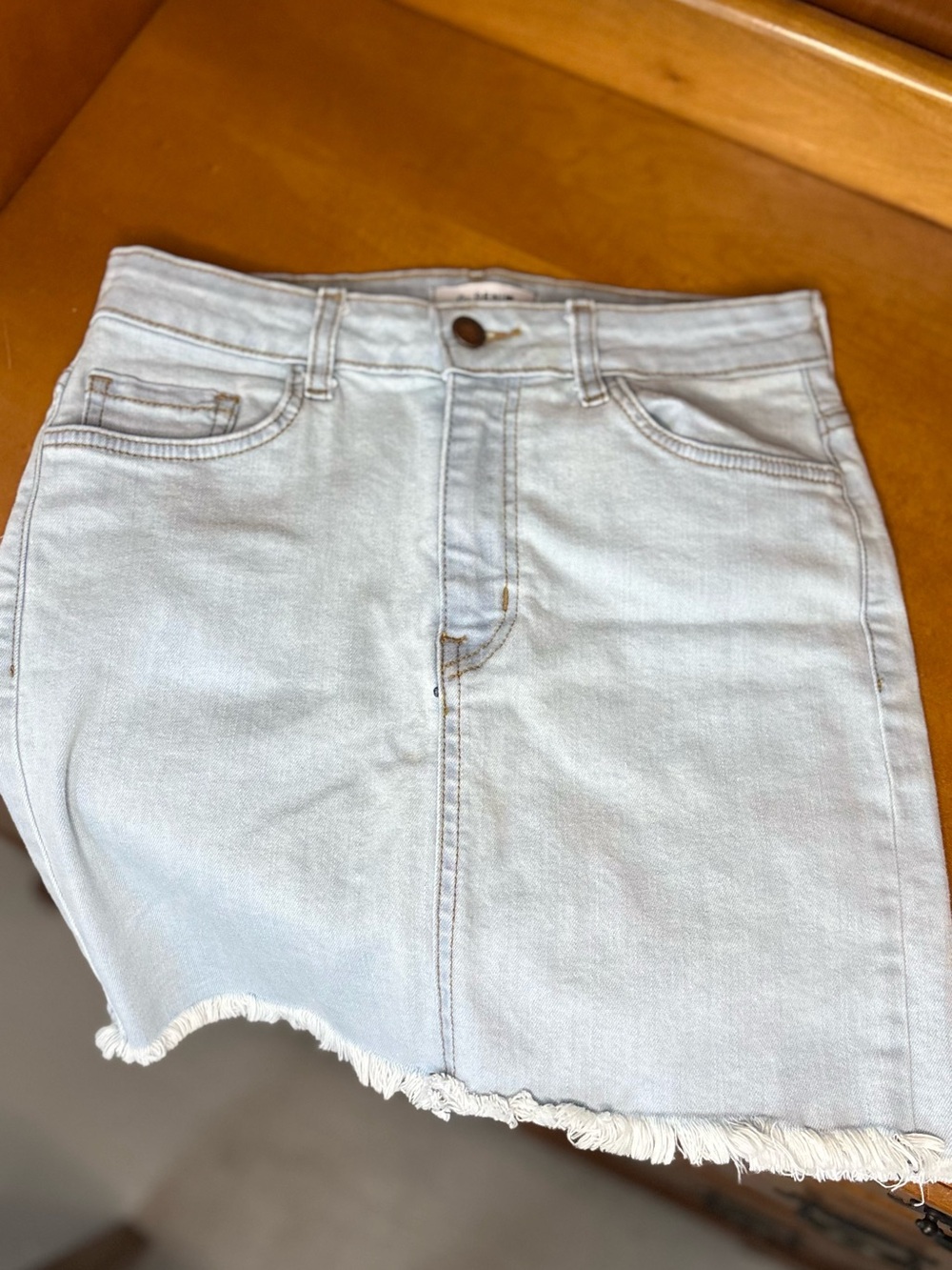 Light Wash Denim Mini Skirt with Frayed Hem